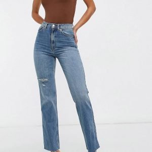 Sexy stylish trendy on tall jeans in dark wash 1